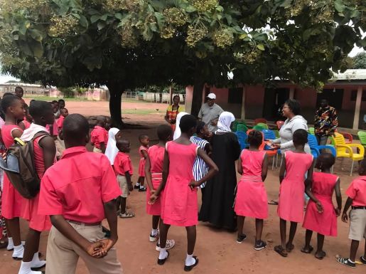 Children receiving school supplies
